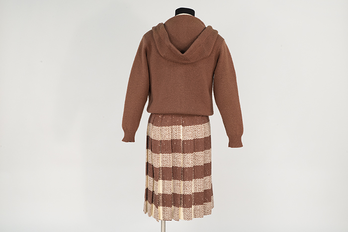 Image of Sweater and skirt ensemble, modeled in the Seattle World's Fair Fashion Pavilion, 1962